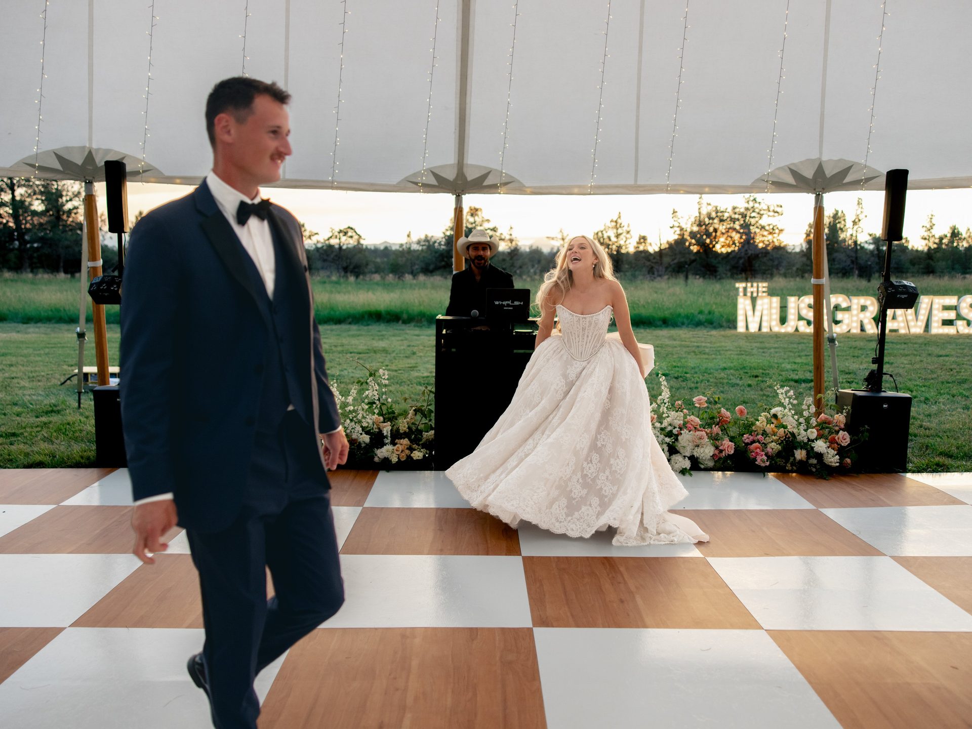 Bride on the dance floor with WHIPLSH at the booth