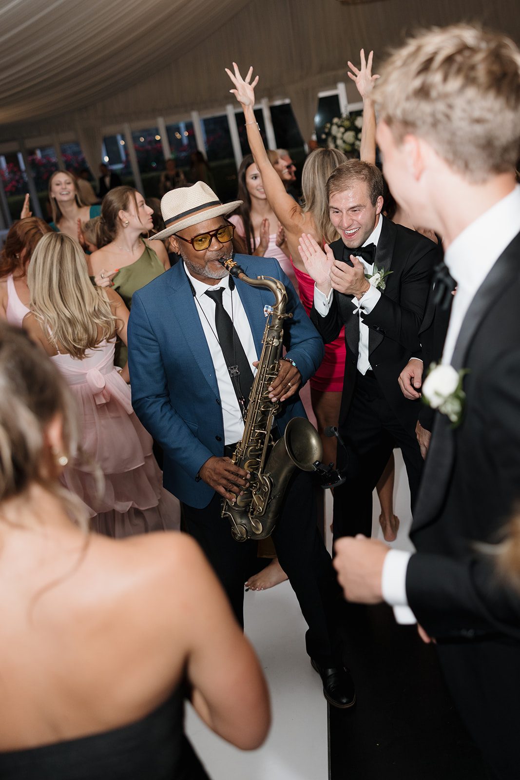Live sax on the dance floor, the room going off